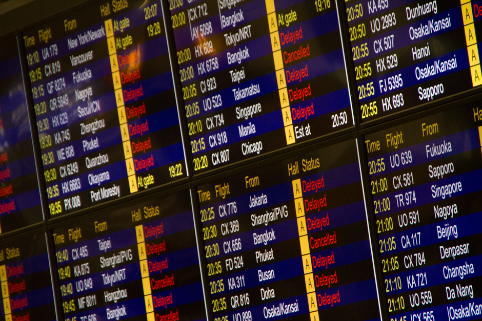 Flight Delay Compensation Claim Steps guide with traveler checking delayed flight details