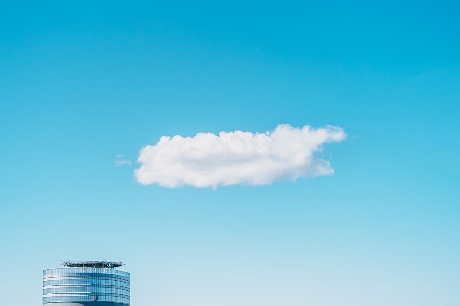 Cloud Engineer Jobs In Europe With Relocation, engineer reviewing European job listings on laptop