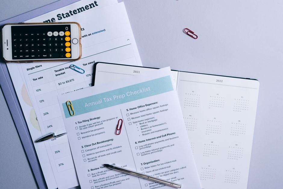 Essential Documents Checklist Before Relocating Abroad Cost Calculator with passport and documents