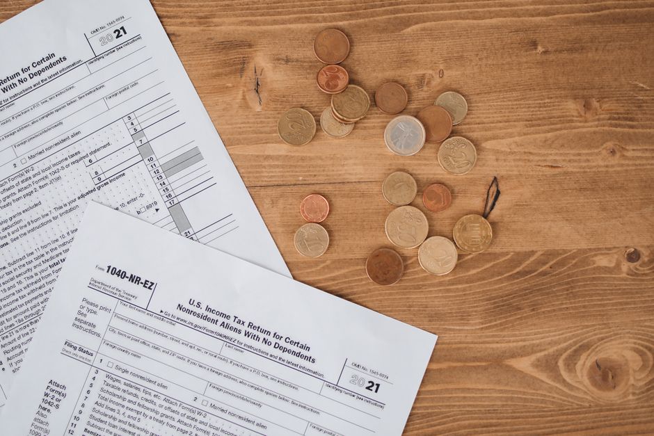 Avoiding Double Taxation Agreement International Income: global tax documents and currency notes